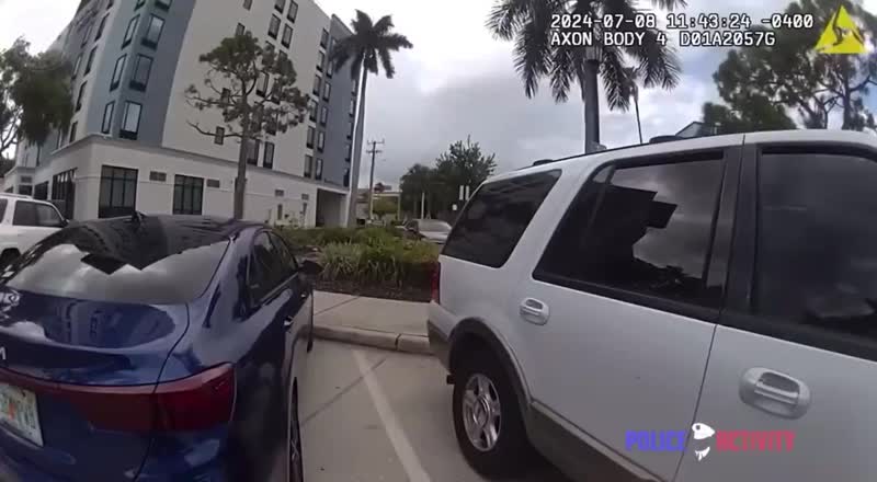 Florida Police breaks SUV Window to rescue dog left in hot car - Viral ...